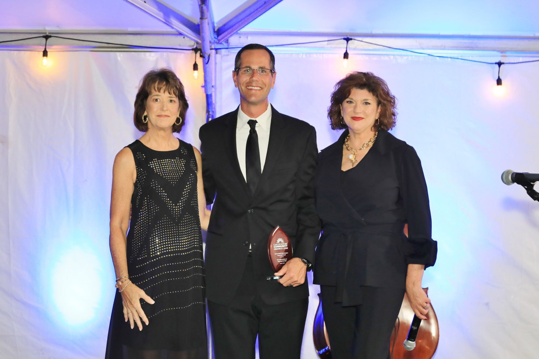 Board Chairperson, Peggy Scott, Todd Smith, Executive Director, Lori Thaman
